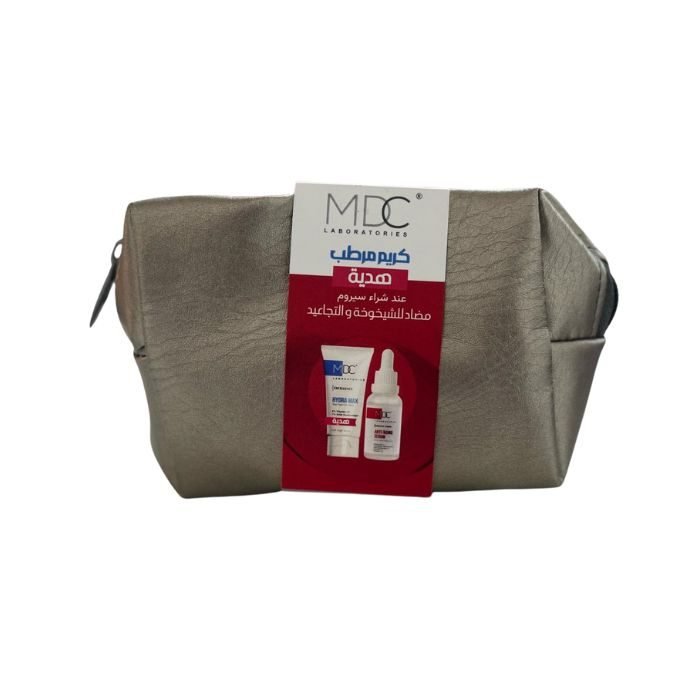 mdc-offre-forever-young-serum-anti-age-30-ml-creme-hydratante-30ml-trousse-offrtes.jpg MDC OFFRE FOREVER YOUNG SERUM ANTI AGE 30 ML + CREME HYDRATANTE 30ML + TROUSSE OFFRTES – Image 1